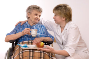 caregiver and old woman