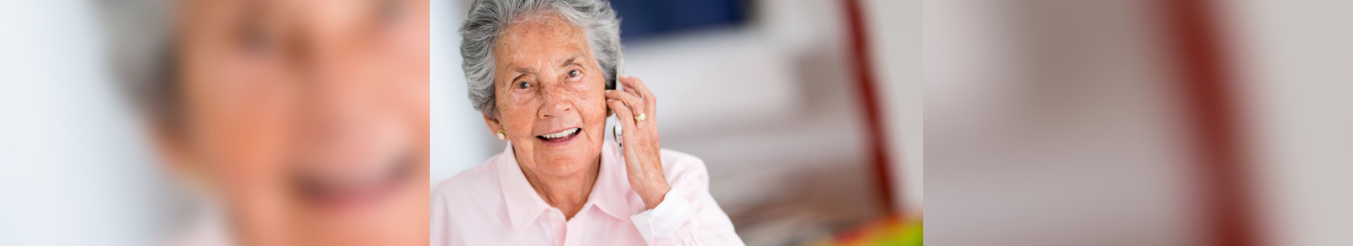 old woman calling someone using her mobile phone